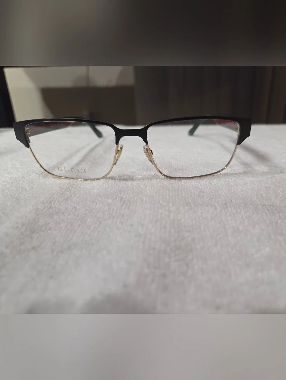 Gucci Black and Gold Half-Rim Eyeglass Frames